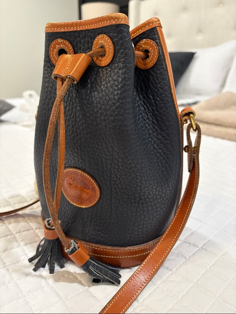 Dooney & Bourke Black Pebble Leather Mini Drawstring Bag with Tan Trim - Picture 2 of 5